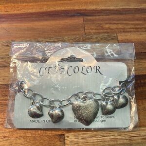 CT Color Silver Tone Hearts Dangling Bracelet. P